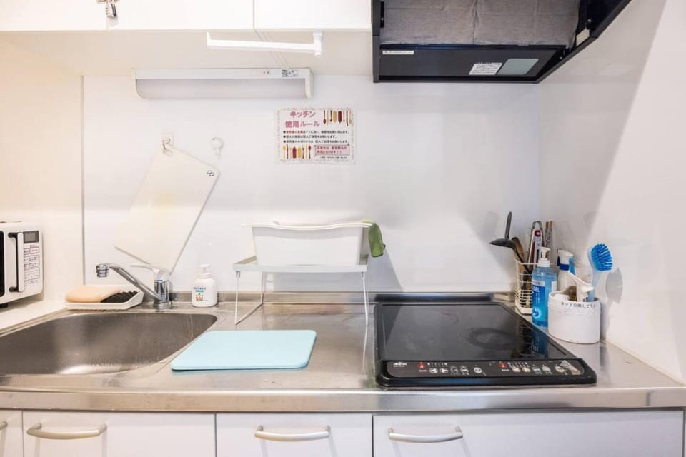 Kitchen or kitchenette, stove