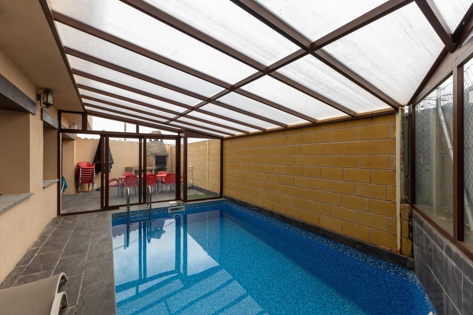Property building, Living room, Swimming pool