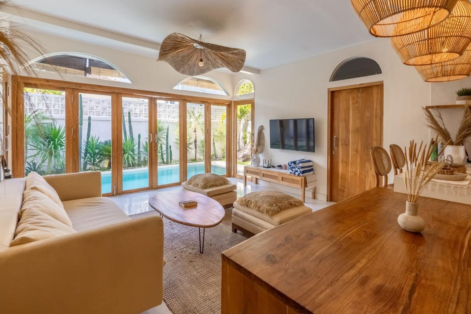 Living room, Seating area, Pool view