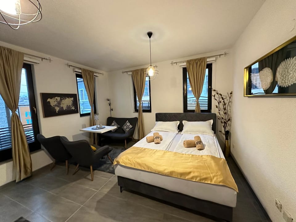 Bed, Living room, Seating area, Bedroom