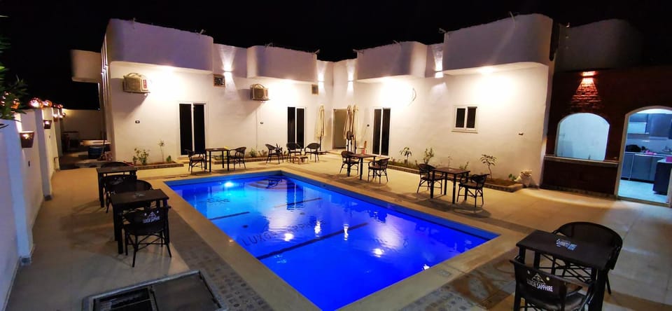 Night, Pool view, Swimming pool, sunbed