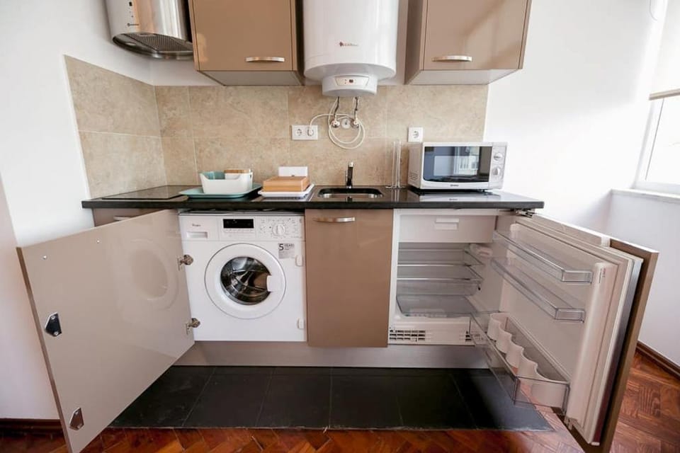 Coffee/tea facilities, Kitchen or kitchenette, microwave, minibar, stove, toaster, washing machine