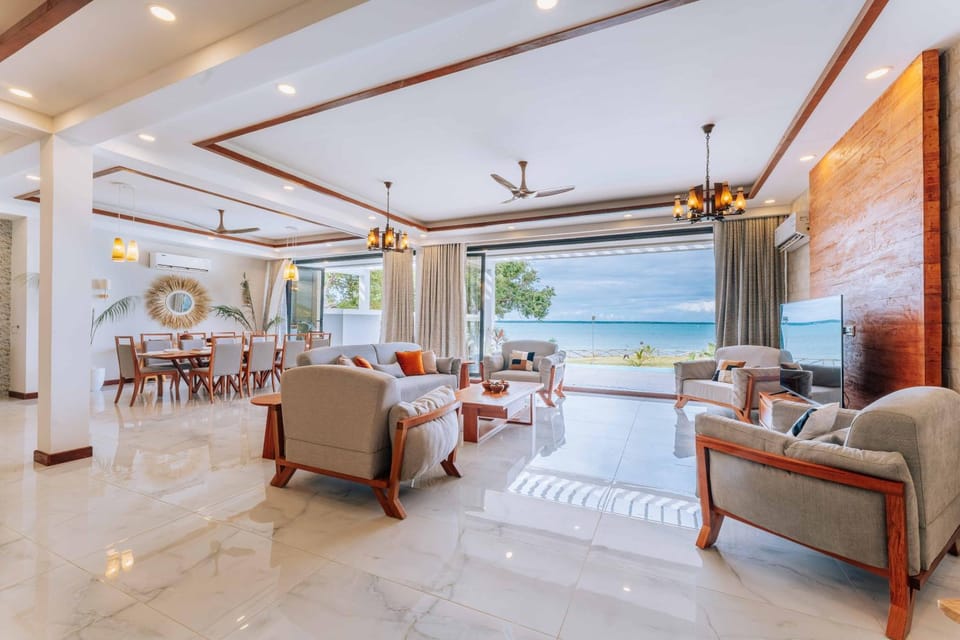 Living room, Seating area, Pool view