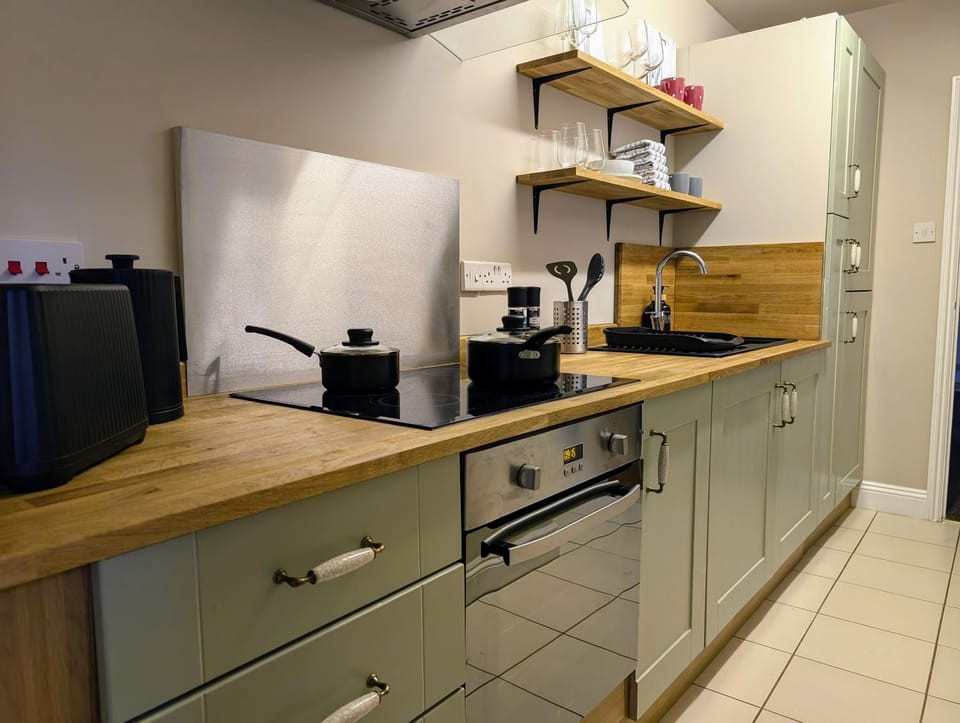 Kitchen or kitchenette, stove, toaster
