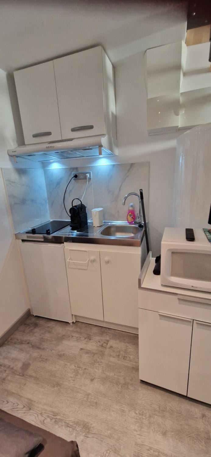 Kitchen or kitchenette, stove