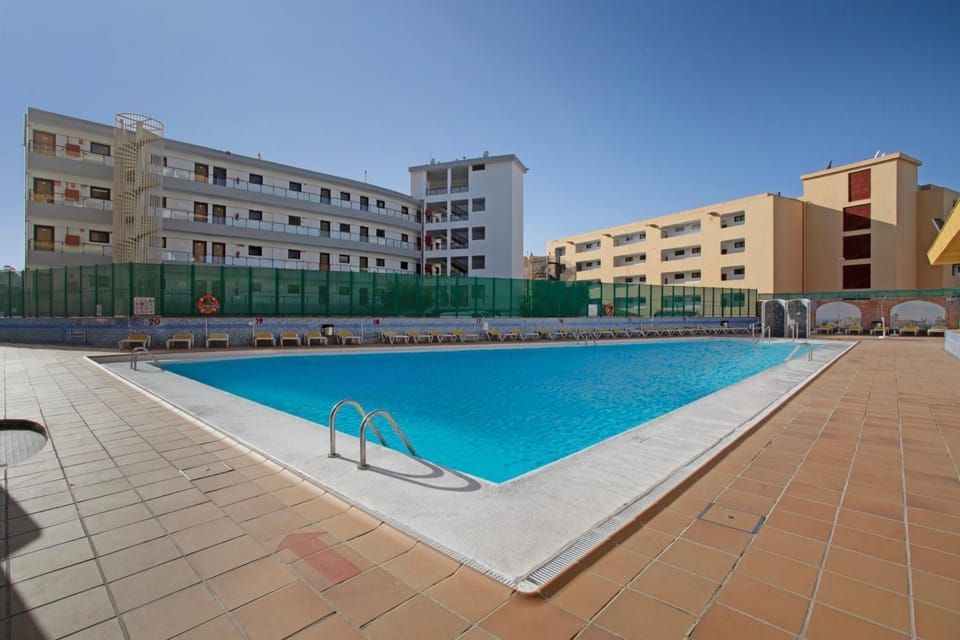 Property building, Living room, Swimming pool