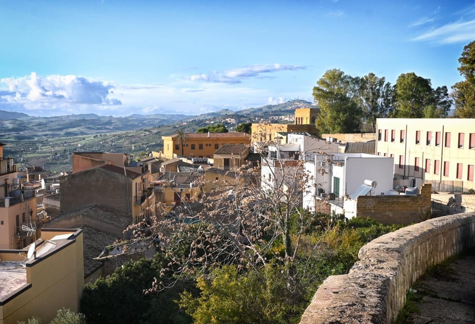 Property building, Nearby landmark, Day, Natural landscape, City view, Landmark view, Mountain view
