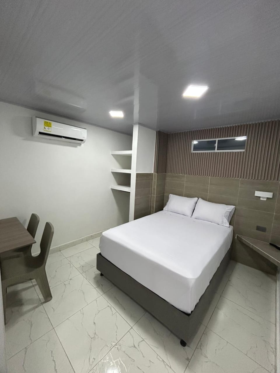 Photo of the whole room, air conditioner