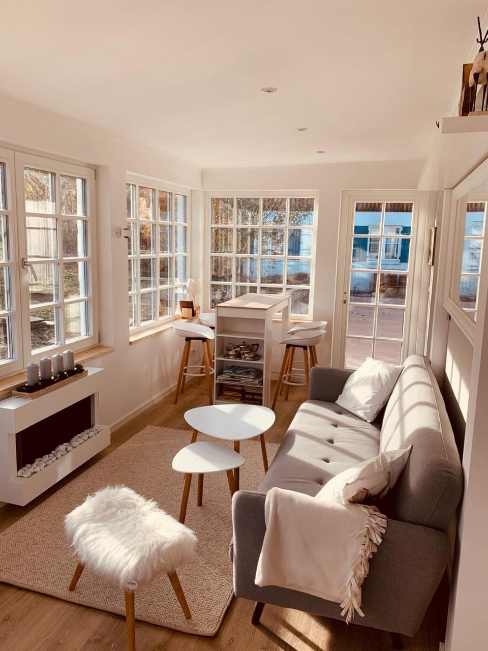 View (from property/room), Living room, Seating area, Sunset