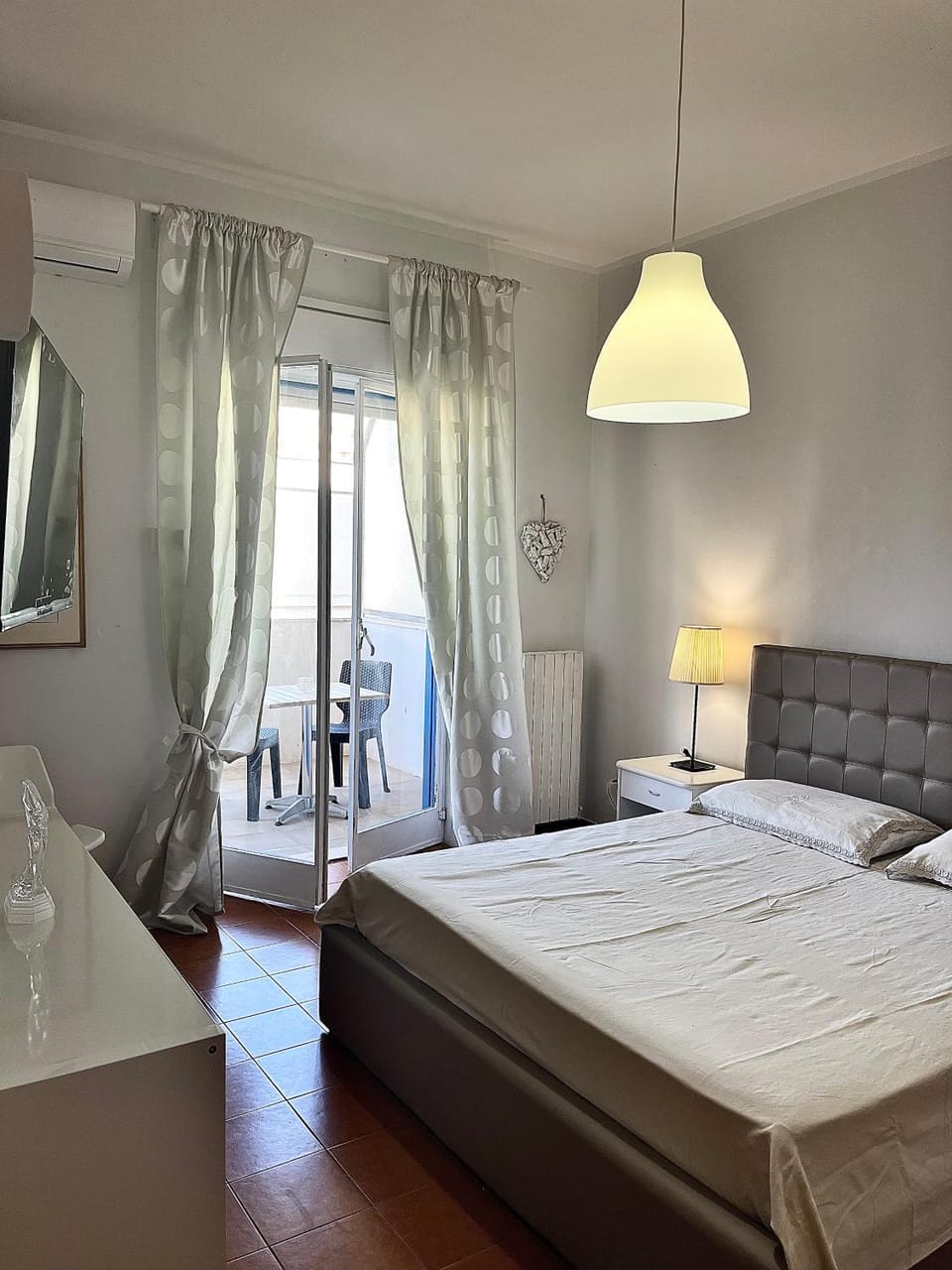 Communal lounge/ TV room, Balcony/Terrace, Bedroom, hair dryier, towels, wardrobe, elevator, air conditioner