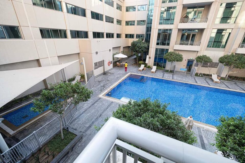 Stylish 1-BR Oasis Minutes from Burj & Dubai Mall Apartment in Dubai