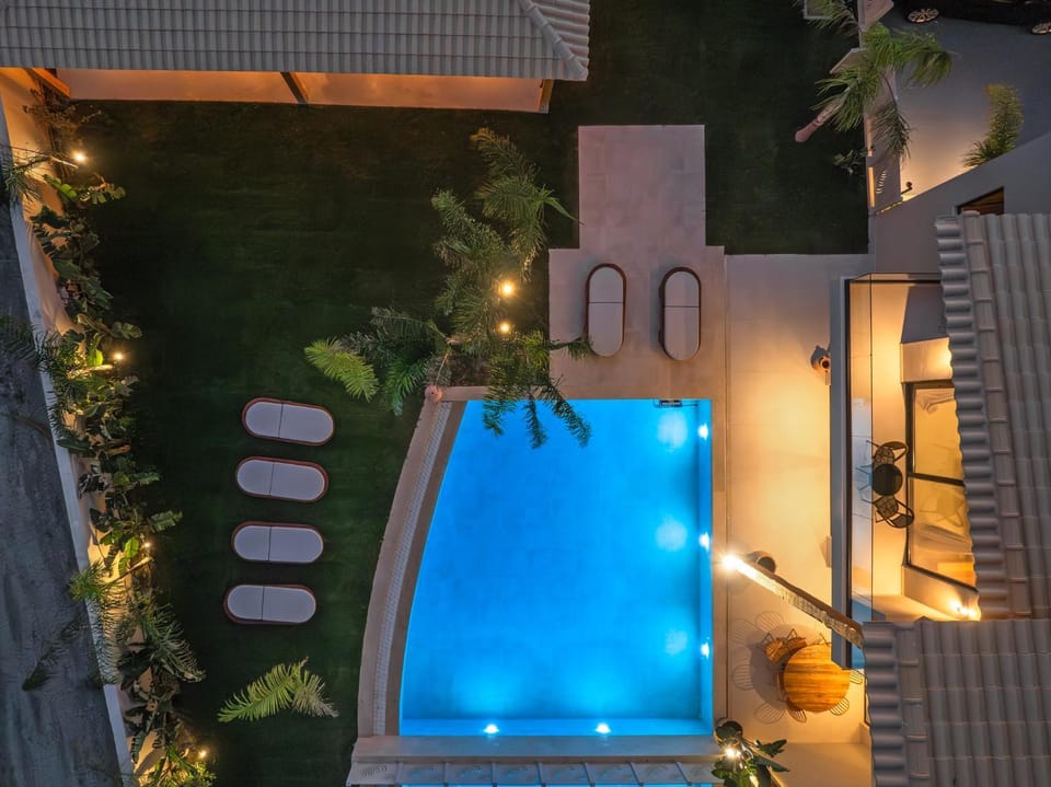 Patio, Night, Pool view, Swimming pool, sunbed