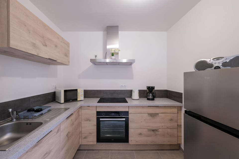 Kitchen or kitchenette, stove
