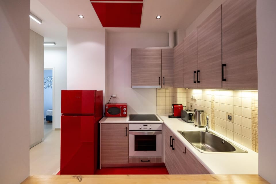 Kitchen or kitchenette, oven, stove, toaster