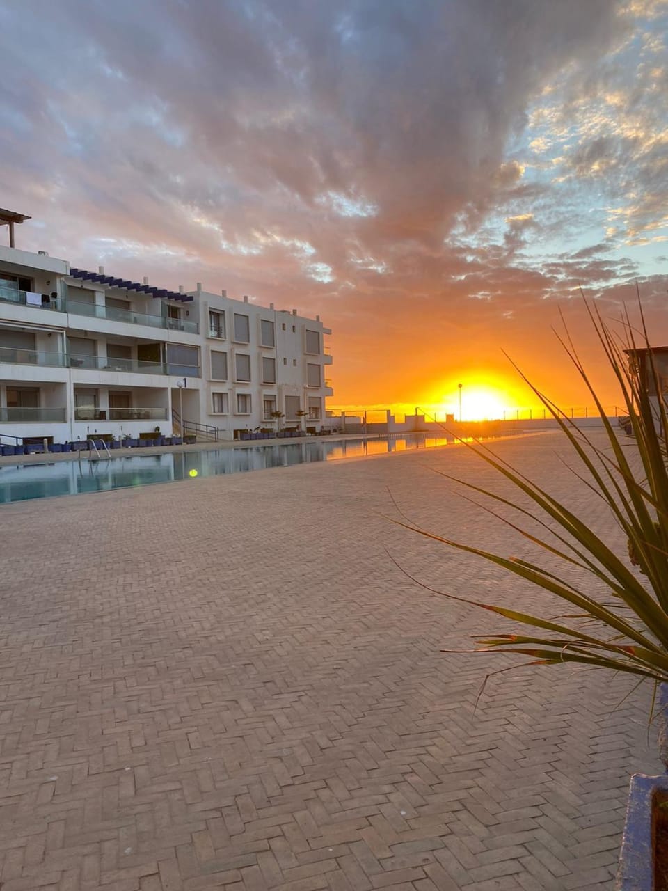 Property building, Natural landscape, Pool view, Swimming pool, Sunset