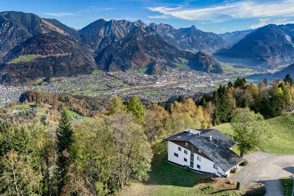 Property building, Facade/entrance, Spring, Off site, Day, Natural landscape, Bird's eye view, Mountain view