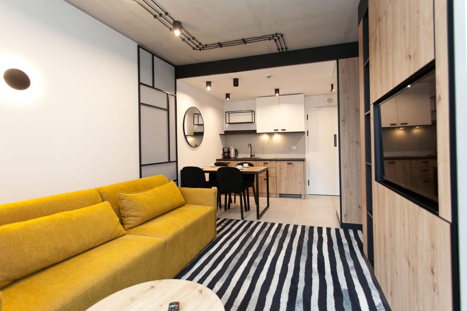 Kitchen or kitchenette, Living room, Seating area, Dining area