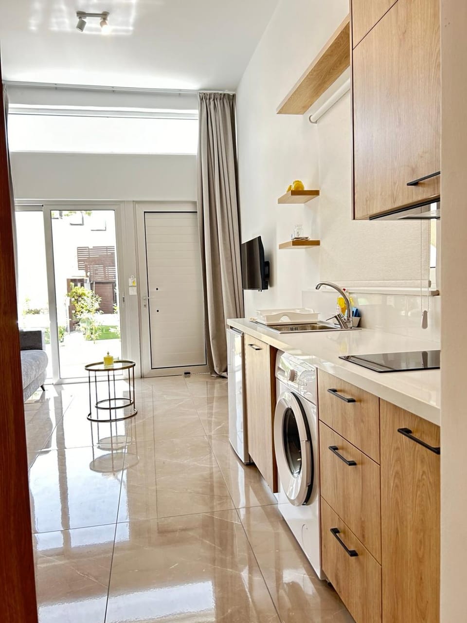 Kitchen or kitchenette, oven, stove, washing machine