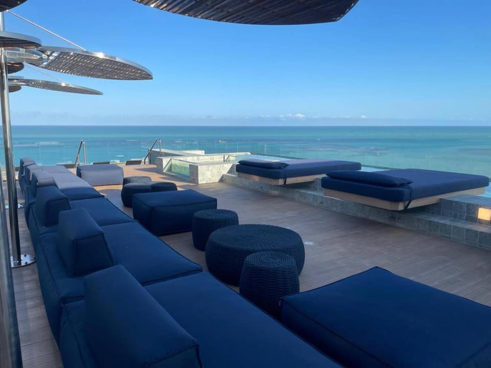 View (from property/room), Pool view, Sea view, Swimming pool, sunbed