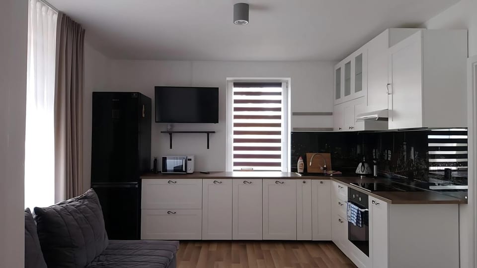 Kitchen or kitchenette, dishwasher, microwave, stove, kitchen