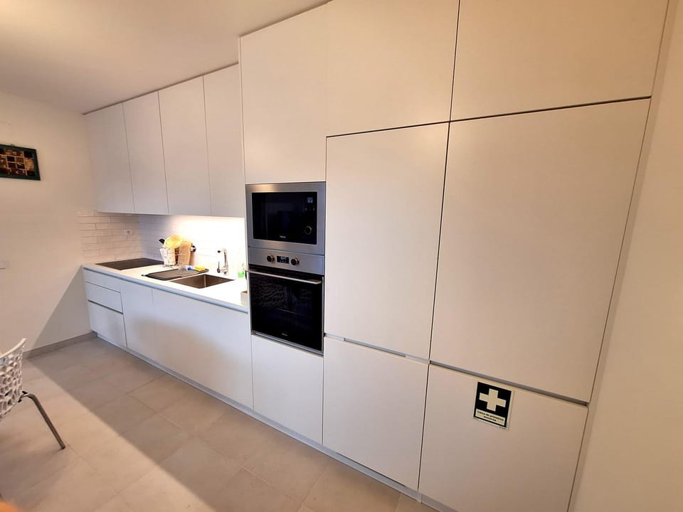Kitchen or kitchenette, oven, stove