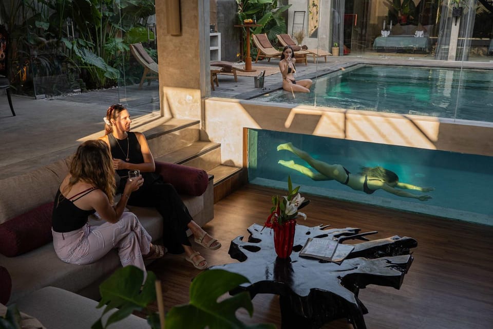 Living room, Seating area, Guests, Pool view