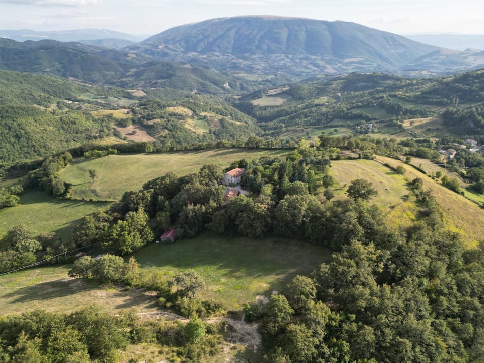 Property building, Nearby landmark, Natural landscape, Bird's eye view