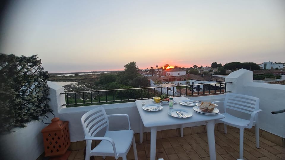 Natural landscape, View (from property/room), Balcony/Terrace, Seating area, Dining area, Sunset