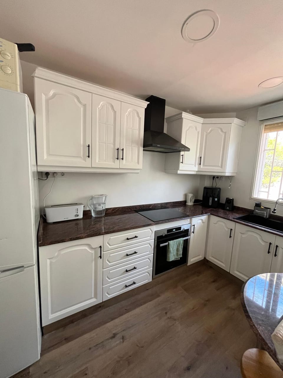 Kitchen or kitchenette, oven, toaster