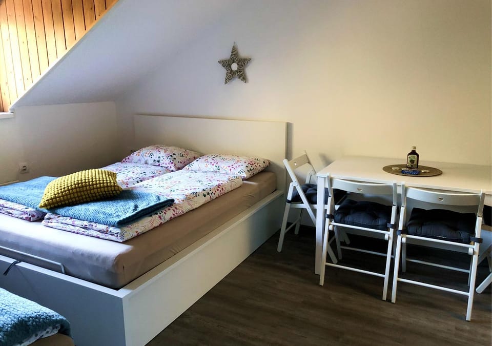 Bed, Seating area, Dining area, Bedroom