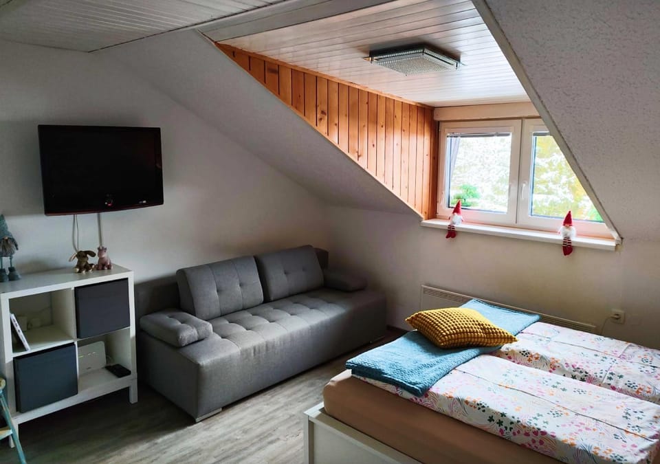 Communal lounge/ TV room, Bed, Living room, Seating area