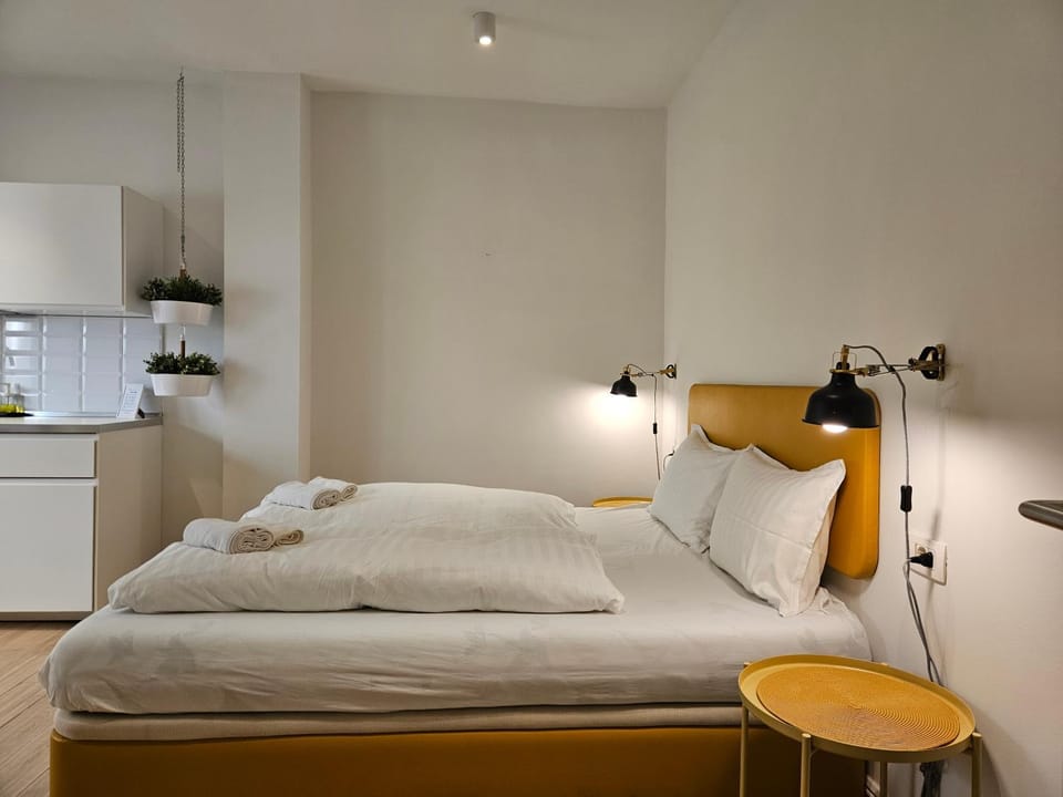 Bed, Kitchen or kitchenette, towels