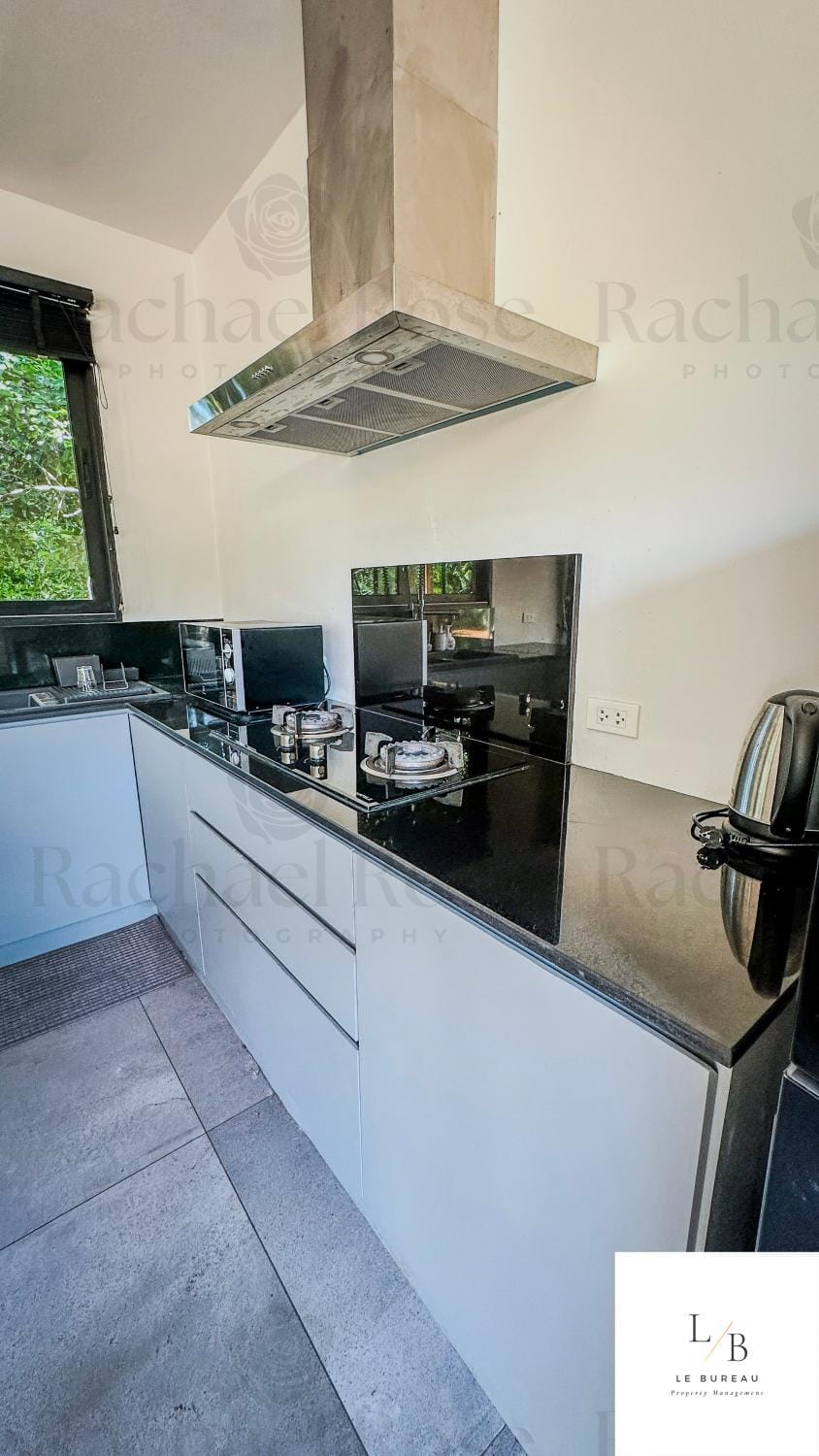 Kitchen or kitchenette, stove, toaster