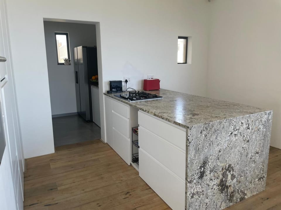 Kitchen or kitchenette, microwave, oven, stove, toaster