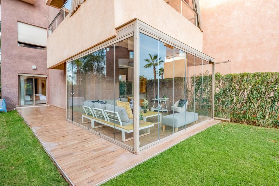 Property building, Patio, Spring, Day, Garden, View (from property/room), Balcony/Terrace, Living room, Seating area, Garden view, Pool view, Swimming pool, sunbed