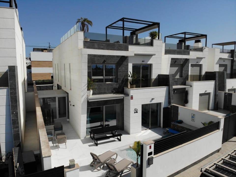 Property building, Patio, Day, View (from property/room), Balcony/Terrace, Pool view, Street view, Swimming pool, sunbed