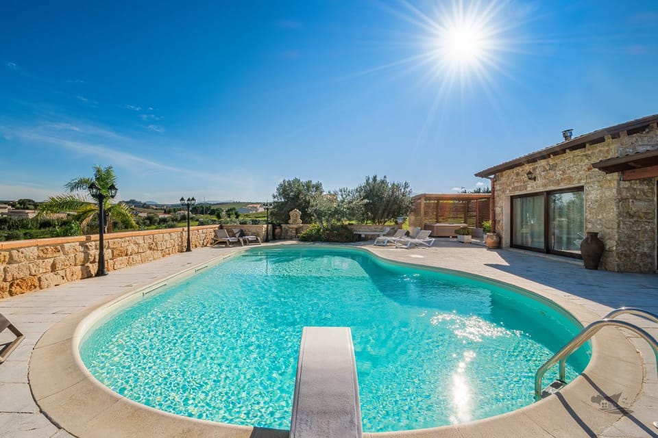 Property building, Natural landscape, Pool view, Swimming pool, Swimming pool, sunbed