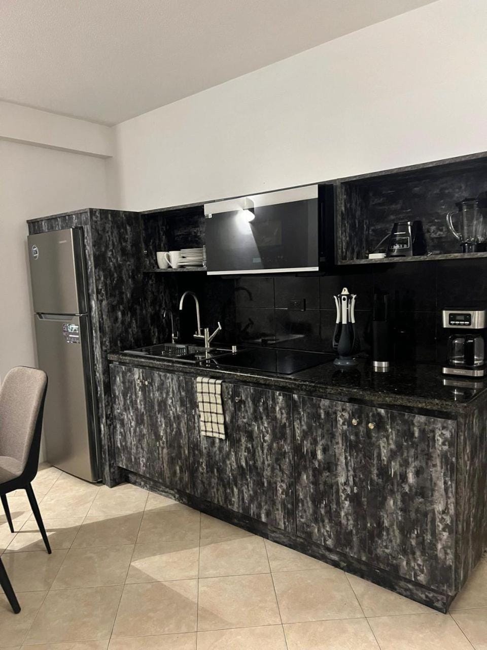 Kitchen or kitchenette, oven