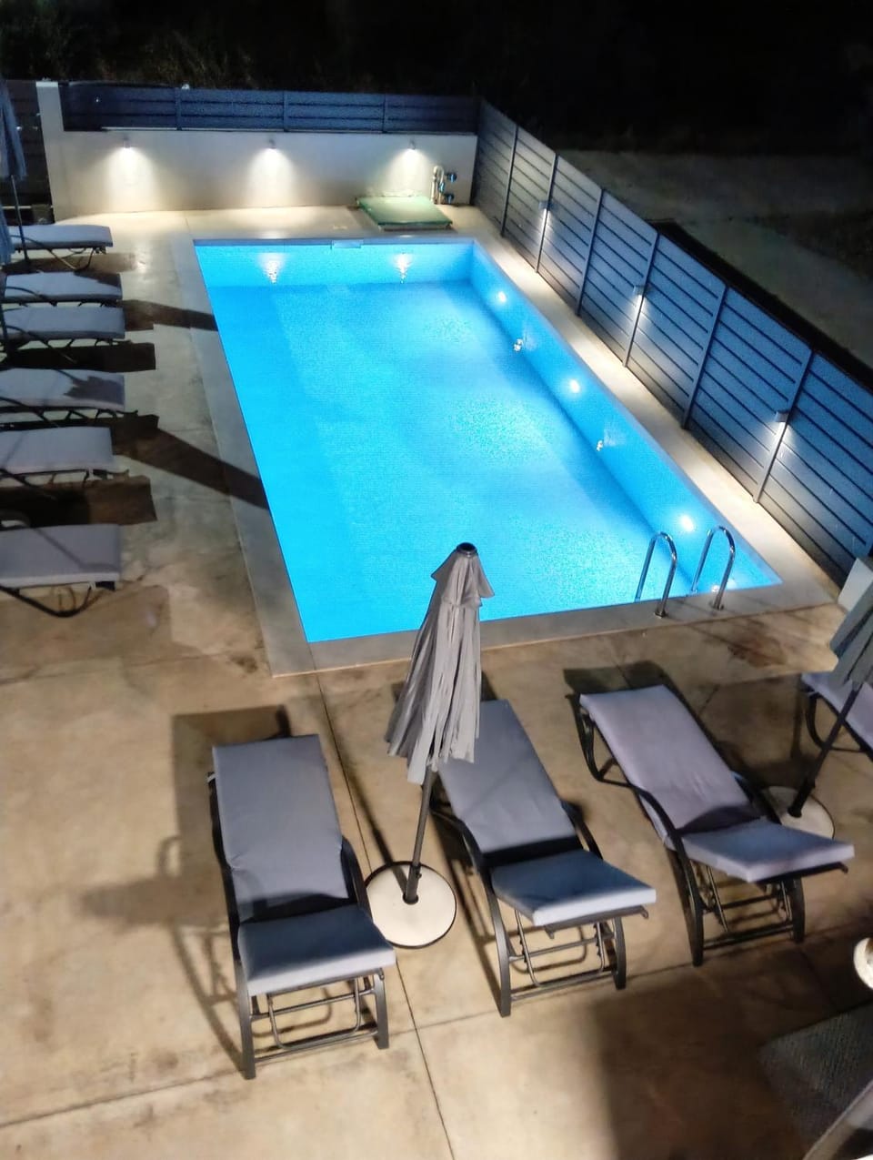 Night, Pool view, Swimming pool, sunbed