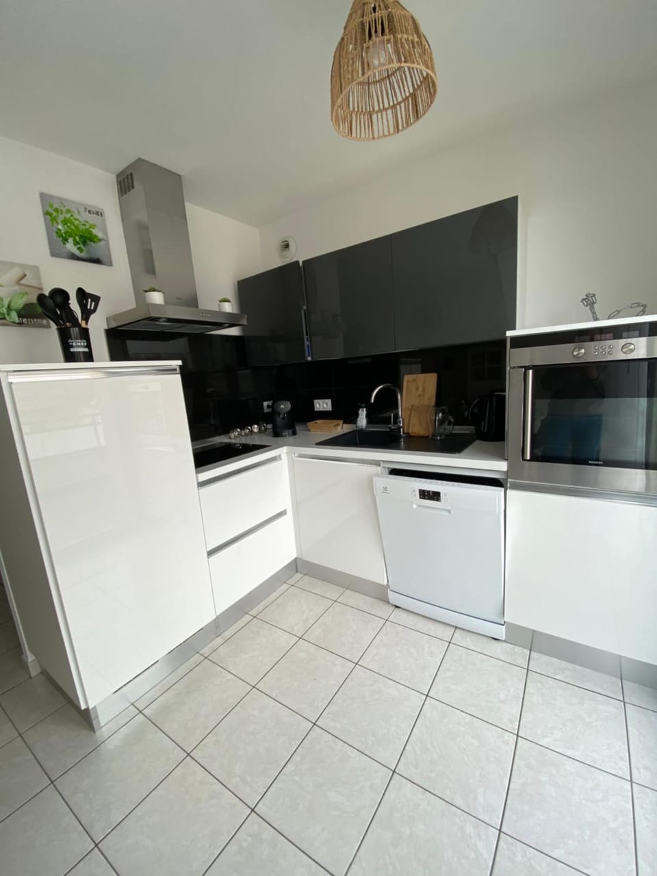 Kitchen or kitchenette, dishwasher, oven, stove