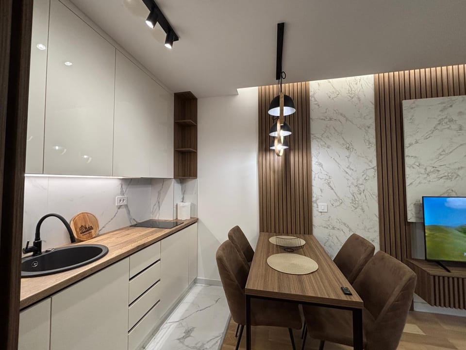 Kitchen or kitchenette, Living room, Seating area, Dining area