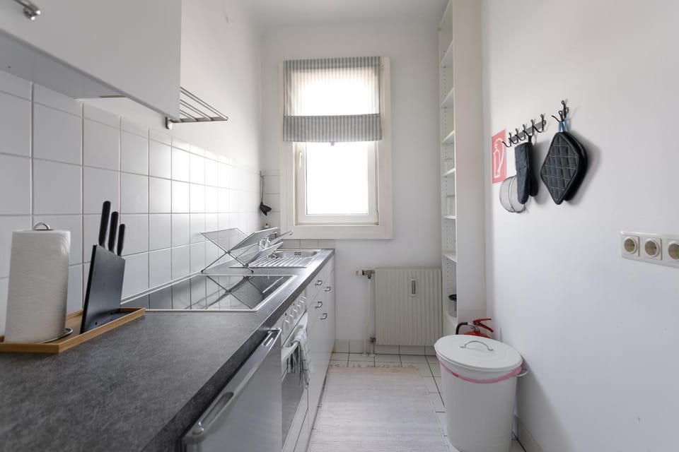 Kitchen or kitchenette, dishwasher, stove, washing machine