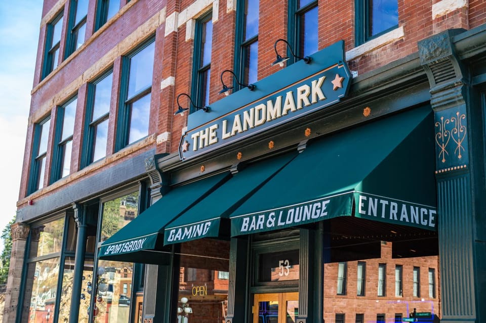 Property building, Restaurant/places to eat, Day, Property logo or sign, Casino, Logo/Certificate/Sign, Text overlay, City view, Street view, Breakfast, Certificate/Award