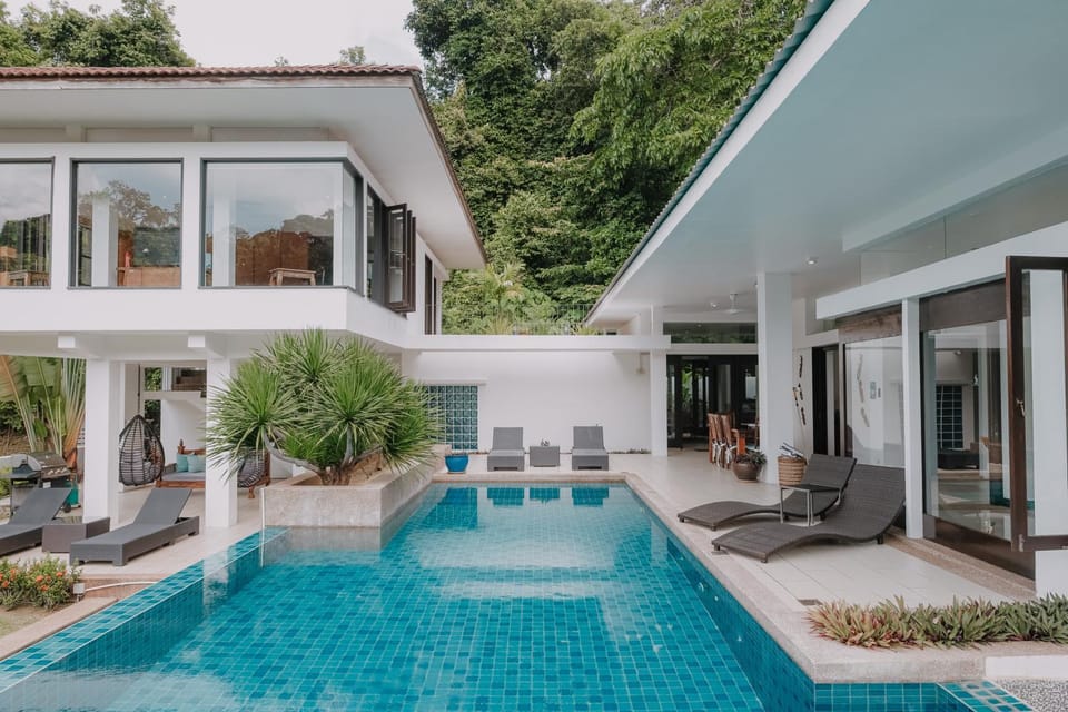 Property building, Patio, Garden, Swimming pool, sunbed
