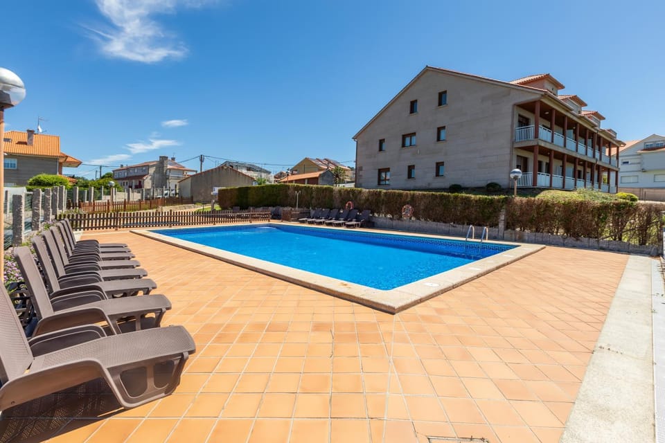 Property building, Pool view, Swimming pool, sunbed