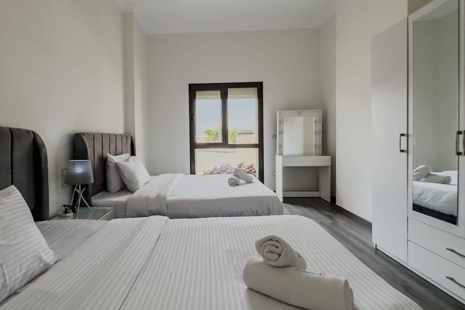 Trendy & Tidy 2BDR Apt 5 min To CAI Airport Apartment in New Cairo City