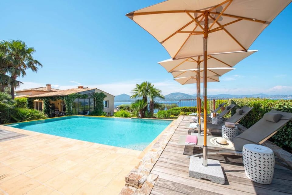 Property building, Patio, Nearby landmark, Spring, Day, Natural landscape, Mountain view, Pool view, Sea view, Swimming pool, sunbed