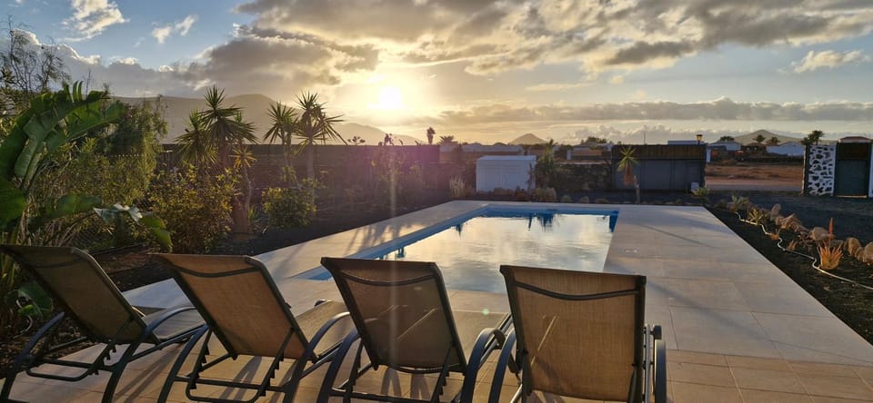 Patio, Natural landscape, Pool view, Swimming pool, Sunset, sunbed