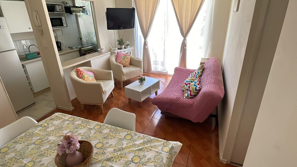 Living room, Dining area, microwave, oven, toaster, washing machine, kitchen