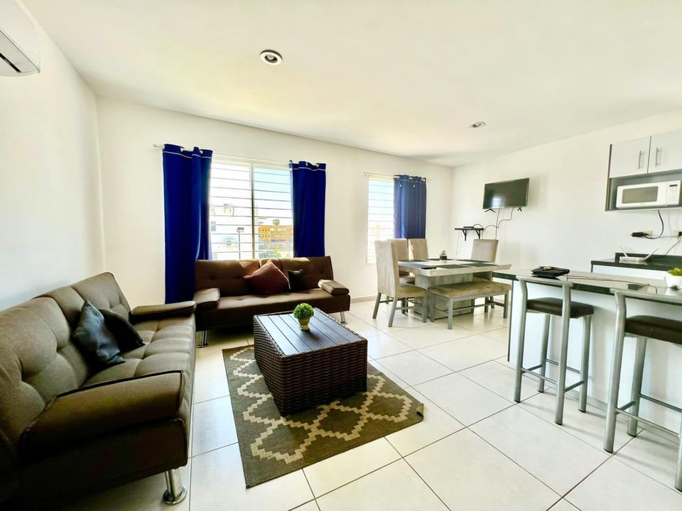 Kitchen or kitchenette, Living room, Seating area, Dining area
